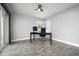 Bright home office with wood-look floors and plenty of natural light at 6102 E Nisbet Rd, Scottsdale, AZ 85254