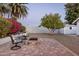 Charming patio area with fire pit, perfect for outdoor entertaining at 6102 E Nisbet Rd, Scottsdale, AZ 85254