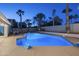 Blue illuminated pool perfect for night swims at 6102 E Nisbet Rd, Scottsdale, AZ 85254