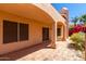 Covered patio with tile flooring and sliding glass doors at 6439 E Redmont Dr, Mesa, AZ 85215