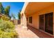 Covered patio with tile flooring and desert landscaping at 6439 E Redmont Dr, Mesa, AZ 85215