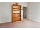 Simple bedroom with built-in shelves and neutral decor at 6751 N 77Th Dr, Glendale, AZ 85303