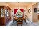 Formal dining room with wood table and chairs, and a hutch at 6751 N 77Th Dr, Glendale, AZ 85303