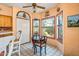 Cozy kitchen nook with a round table and chairs, plus a view of the backyard at 6751 N 77Th Dr, Glendale, AZ 85303