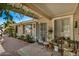 Covered patio with seating and potted plants at 6810 W Vermont Ave, Glendale, AZ 85303