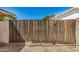 Wooden gate providing access to the backyard at 6810 W Vermont Ave, Glendale, AZ 85303