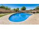 Inviting kidney-shaped pool in a sunny backyard at 6810 W Vermont Ave, Glendale, AZ 85303