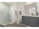 Clean bathroom with walk-in shower and double vanity at 7180 E Kierland Blvd # 516, Scottsdale, AZ 85254