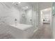 Elegant bathroom featuring marble shower and soaking tub at 7180 E Kierland Blvd # 516, Scottsdale, AZ 85254