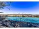 Resort-style pool with city views and lounge chairs at 7180 E Kierland Blvd # 516, Scottsdale, AZ 85254