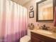 Clean bathroom with single vanity and shower/tub combo at 7750 E Broadway Rd # 123, Mesa, AZ 85208