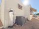 Home's exterior showing AC unit and water softener at 7750 E Broadway Rd # 123, Mesa, AZ 85208