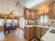 Galley kitchen with ample cabinets and appliances at 7750 E Broadway Rd # 123, Mesa, AZ 85208