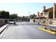 Gated community entrance with designated parking at 7904 E Pepper Tree Ln, Scottsdale, AZ 85250