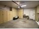 Garage with built-in storage cabinets at 7904 E Pepper Tree Ln, Scottsdale, AZ 85250