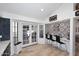 Kitchen features a breakfast bar with a decorative tile backsplash at 7904 E Pepper Tree Ln, Scottsdale, AZ 85250