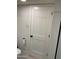 Clean bathroom with a toilet and door to additional space at 7950 E Starlight Way # 142, Scottsdale, AZ 85250