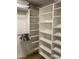 Spacious walk-in closet with ample shelving and hanging space at 7950 E Starlight Way # 142, Scottsdale, AZ 85250