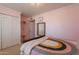 Charming bedroom with double doors and a cozy bed at 8119 E San Miguel Ave, Scottsdale, AZ 85250