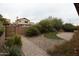 Landscaped backyard with patio and artificial turf at 831 E Spanish Moss Ln, Phoenix, AZ 85022