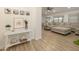 Bright and airy entryway with a console table and view to living room at 831 E Spanish Moss Ln, Phoenix, AZ 85022