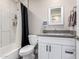 Clean bathroom with tub, shower, and vanity at 8431 E Stella Ln, Scottsdale, AZ 85250