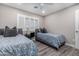 Bedroom with two twin beds and window at 8431 E Stella Ln, Scottsdale, AZ 85250