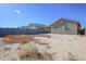 Large, unlandscaped backyard with block wall at 8637 N 168Th Dr, Waddell, AZ 85355