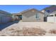 Large backyard with block wall and sandy terrain at 8637 N 168Th Dr, Waddell, AZ 85355