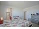 Primary bedroom with dresser and en-suite at 8637 N 168Th Dr, Waddell, AZ 85355