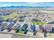 Aerial view of community with homes and green spaces at 8637 N 168Th Dr, Waddell, AZ 85355