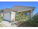 One-story house with a covered porch and well-maintained landscaping at 8637 N 168Th Dr, Waddell, AZ 85355