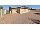 Spacious backyard with gravel and block wall at 9283 W Rafael Dr, Arizona City, AZ 85123