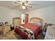 Bedroom with double bed and ceiling fan at 9283 W Rafael Dr, Arizona City, AZ 85123