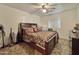 Bedroom with double bed and ceiling fan at 9283 W Rafael Dr, Arizona City, AZ 85123