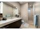 Modern bathroom with a walk-in shower, updated vanity, and stylish fixtures at 9374 E Andora Hills Dr, Scottsdale, AZ 85262