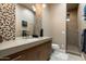 Stylish bathroom with a walk-in shower and mosaic tile at 9374 E Andora Hills Dr, Scottsdale, AZ 85262