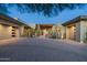 Modern home with expansive driveway and desert landscaping at 9374 E Andora Hills Dr, Scottsdale, AZ 85262