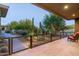 Relaxing patio space with desert landscaping and comfortable seating at 9374 E Andora Hills Dr, Scottsdale, AZ 85262