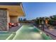 Modern swimming pool with stone accents and a view at 9374 E Andora Hills Dr, Scottsdale, AZ 85262