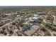 Aerial view of a luxury home with a pool and tennis court in a desert setting at 9570 E Via Montoya Dr, Scottsdale, AZ 85255