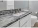 Modern bathroom with gray marble countertop and updated fixtures at 9570 E Via Montoya Dr, Scottsdale, AZ 85255