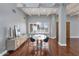 Elegant dining room with hardwood floors and a modern table set at 9570 E Via Montoya Dr, Scottsdale, AZ 85255