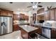 Spacious kitchen with granite countertops and stainless steel appliances at 9621 N 94Th Dr, Peoria, AZ 85345