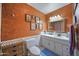 Bathroom with toilet, sink and vanity at 101 S Mesquite St, Wickenburg, AZ 85390