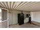 Small outdoor kitchen with refrigerator at 102 S 83Rd Pl, Mesa, AZ 85208