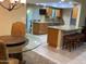 Modern kitchen with granite countertops, ample cabinetry, and an island at 10511 W Tropicana Cir, Sun City, AZ 85351