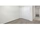 Bedroom with sliding door closet and neutral carpet at 109 S Collier Ln, Casa Grande, AZ 85122