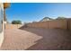 Large backyard with gravel and block wall at 1125 W Fruit Tree Ln, San Tan Valley, AZ 85143