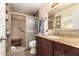 Updated bathroom with walk-in shower and granite vanity at 12234 S Pewaukee St, Phoenix, AZ 85044